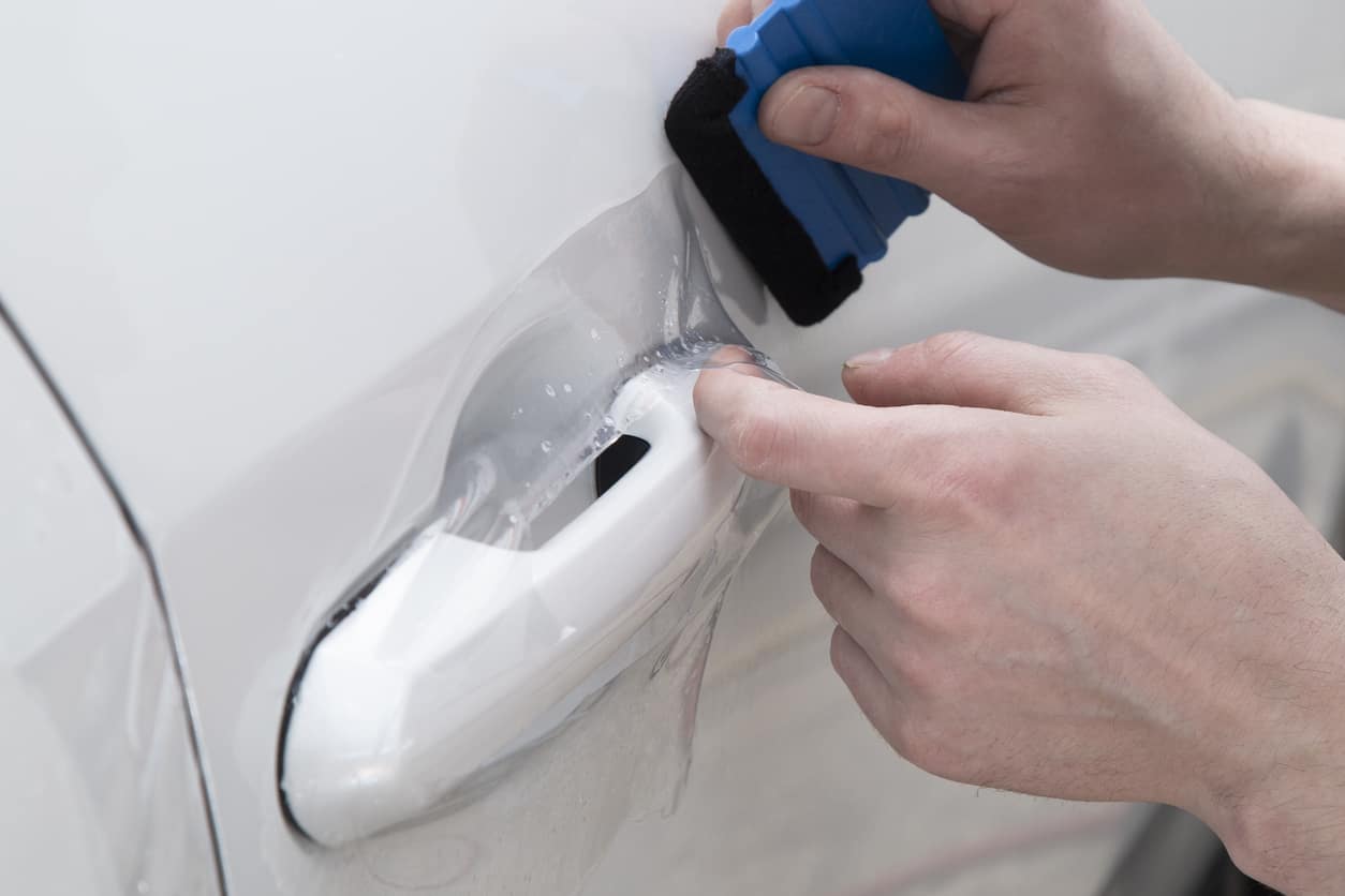 Installing a protective film on the car body