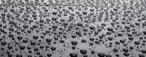 Water drops on car paint. Hydrophobic water effect on car body